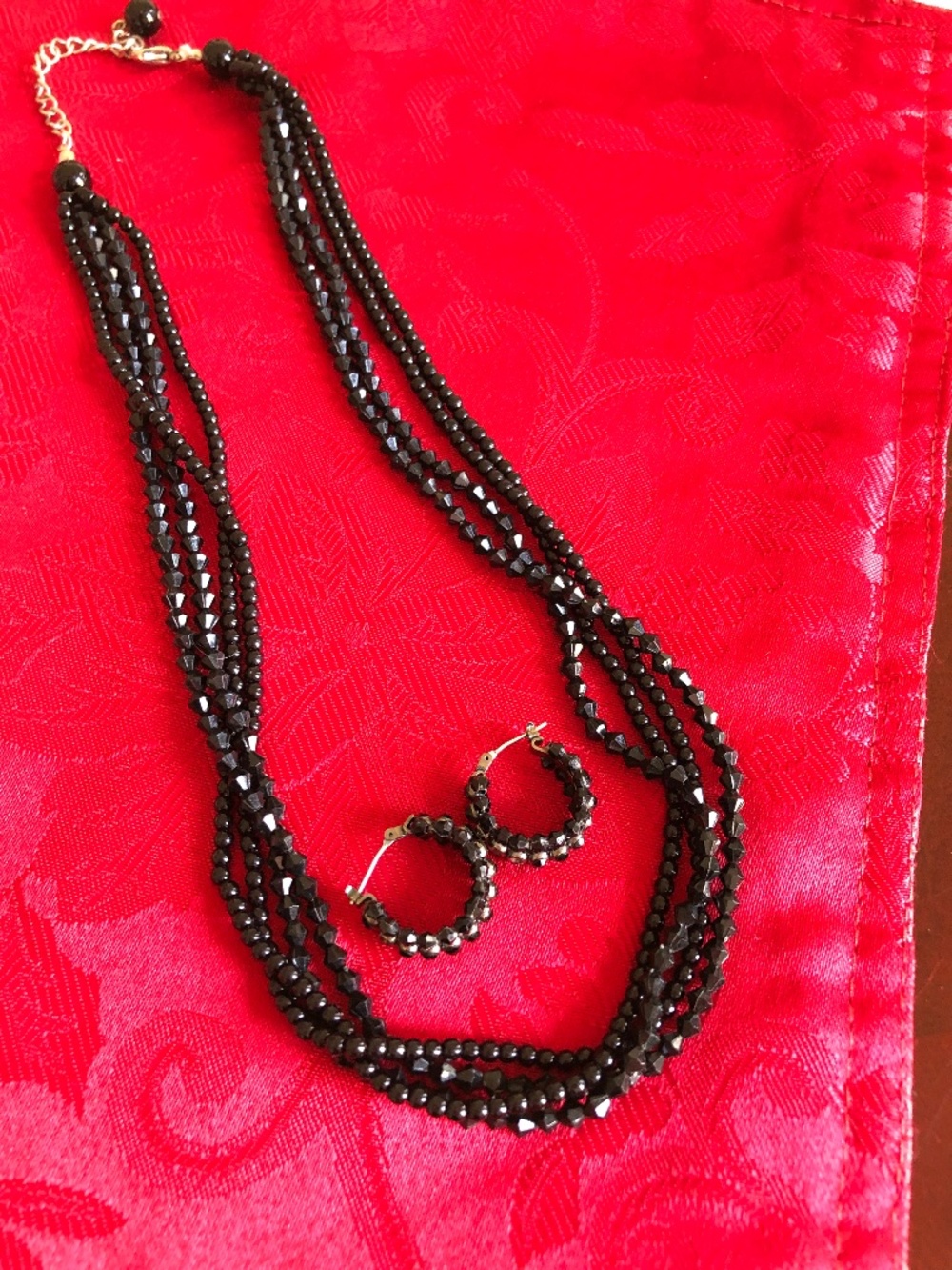 Black multi strand necklace and earrings